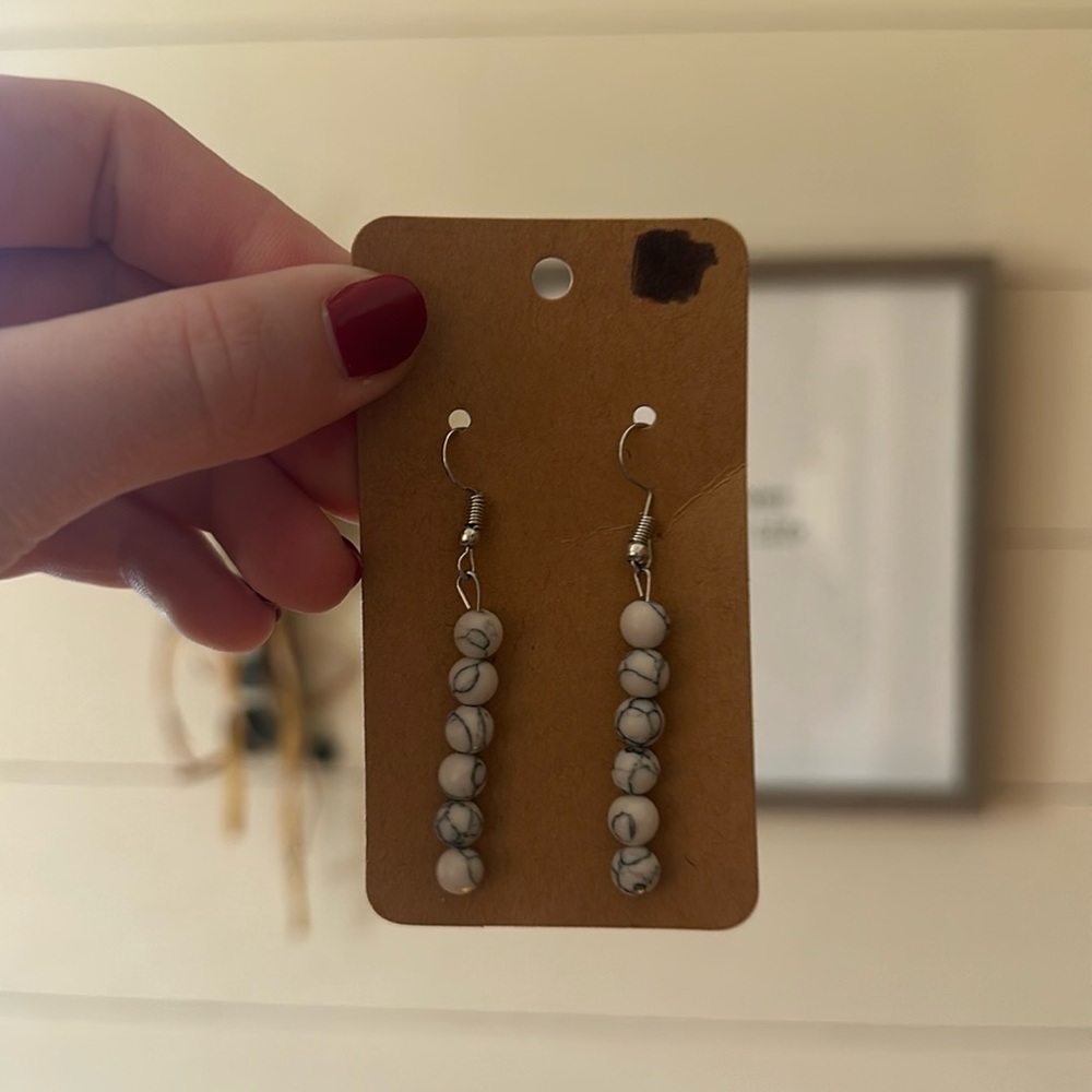 Faux white buffalo earrings